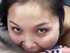 Oriental Lucy swallowing a cock in this First person view scene